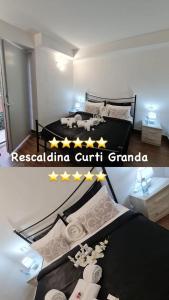 Postel nebo postele na pokoji v ubytování Curti Granda