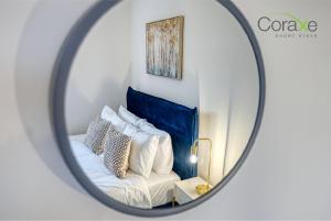 Ένα ή περισσότερα κρεβάτια σε δωμάτιο στο 3 Bedroom Blissful Living for Contractors and Families by Coraxe Short Stays