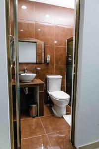 Koupelna v ubytování Hotel Naomi City center