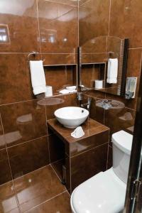 Koupelna v ubytování Hotel Naomi City center