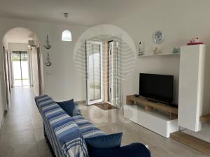 A seating area at Villa Alysa - spiaggia a 400m By Cala Salento