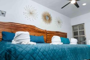 Postel nebo postele na pokoji v ubytování Hotel Naomi City center