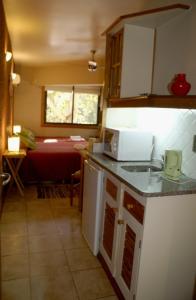 A cozinha ou cozinha compacta de Hotel Xumec Mendoza
