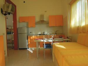 A kitchen or kitchenette at One bedroom flat with terrace and sea view