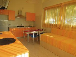A kitchen or kitchenette at One bedroom flat with terrace and sea view