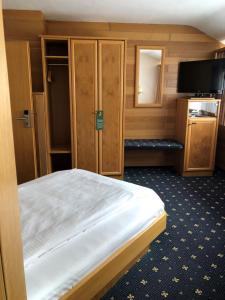 Postel nebo postele na pokoji v ubytování Hotel Simonshof