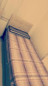 Postel nebo postele na pokoji v ubytování شقه فاخره بأحد أجمل وأرقى أحياء إسطنبول