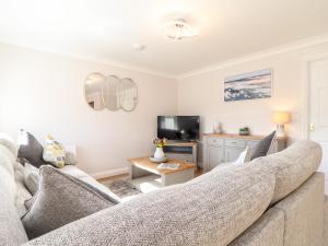 TV a/nebo společenská místnost v ubytování Gweal