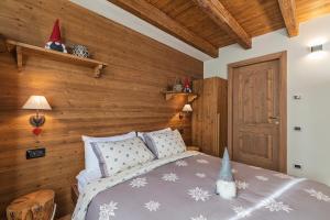 Postel nebo postele na pokoji v ubytování Malga Laben