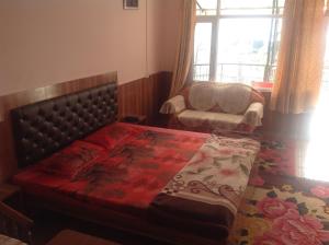 Cama o camas de una habitación en Hotel Ekant Lodge