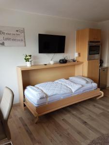 Postel nebo postele na pokoji v ubytování Dat-Harzchen-mit-Garage-und-WLAN