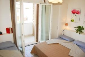 A bed or beds in a room at Wonderful apartment with attic in a quiet area