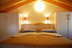 A bed or beds in a room at Wonderful apartment with attic in a quiet area