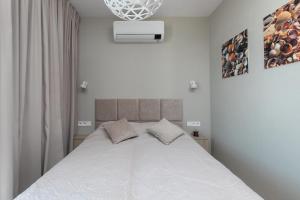 Postel nebo postele na pokoji v ubytování Lighthouse Luxury Penthouse - Jantar Apartamenty