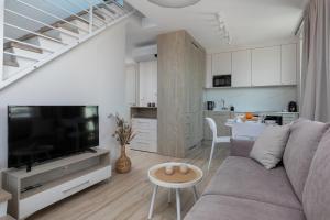 TV a/nebo společenská místnost v ubytování Lighthouse Luxury Penthouse - Jantar Apartamenty