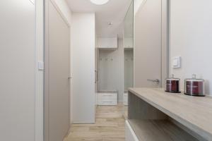 Kuchyň nebo kuchyňský kout v ubytování Lighthouse Luxury Penthouse - Jantar Apartamenty