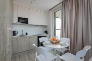 Kuchyň nebo kuchyňský kout v ubytování Lighthouse Luxury Penthouse - Jantar Apartamenty
