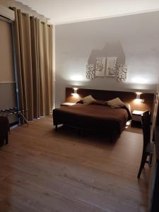Postel nebo postele na pokoji v ubytování Hotel Leone