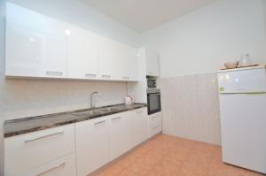 Kuchyňa alebo kuchynka v ubytovaní Apartments Romina