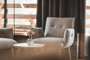 Χώρος καθιστικού στο Boutique Hotel und Chalets Bergwiesenglück