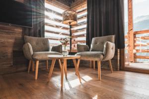 Χώρος καθιστικού στο Boutique Hotel und Chalets Bergwiesenglück