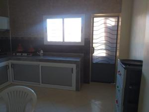 Postel nebo postele na pokoji v ubytování Appartement à louer Tiznit 1