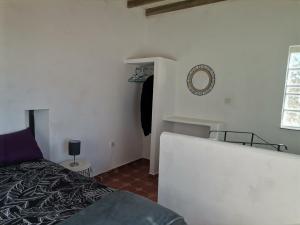 Giường trong phòng chung tại Casita Rural con Encanto