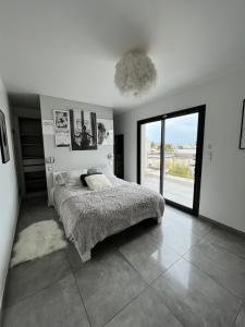 Letto o letti in una camera di Eclipse Rochelongue