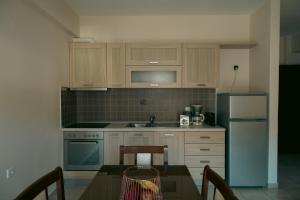 Kuchyň nebo kuchyňský kout v ubytování Baia Blu Apartments
