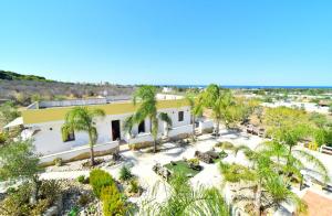 an aerial view of a building with palm trees at Piccolo Residence Gallipoli in Gallipoli