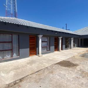 a building with doors and windows on it at 2NIGHTS GUEST HOUSE in Mokopane