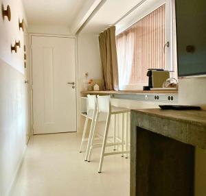 Kuchyň nebo kuchyňský kout v ubytování Le4bergheim Chambre d'hôtes