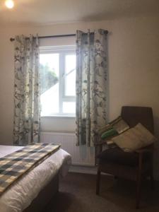 Rúm í herbergi á Bayview House Dungloe