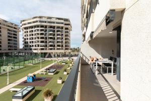 a view from the balcony of a building at Veramar Beach Apartment in Valencia