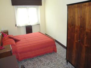 Postel nebo postele na pokoji v ubytování La Piazza B&B