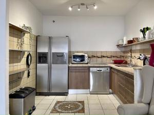 Η κουζίνα ή μικρή κουζίνα στο Apartamento Alyanna