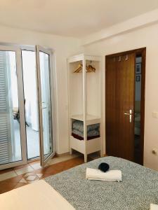 Кровать или кровати в номере Green Paradise Apartment Novalja