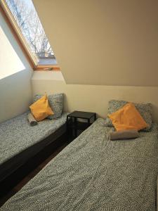 A bed or beds in a room at Hostel 55 - darmowy parking