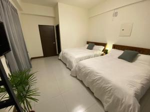 Llit o llits en una habitació de 18 Walking Homestay