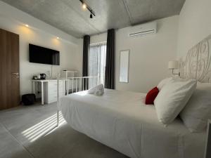 Katil atau katil-katil dalam bilik di Casa Leon Malta