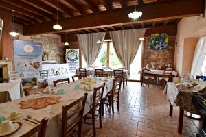 Restoran või mõni muu söögikoht majutusasutuses Corte delle Giuggiole