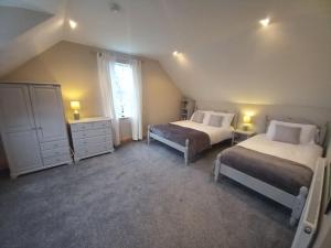 Postel nebo postele na pokoji v ubytování The Apartment