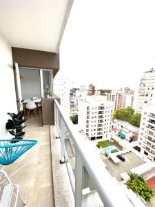 an apartment balcony with a view of a city at Dpto luminoso excelente zona in La Plata