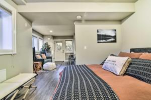 a bedroom with a bed and a living room at Walkable Portland Studio Less Than 1 Mi to Dtwn! in Portland
