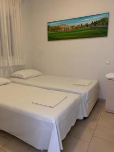 Postel nebo postele na pokoji v ubytování Tereza House