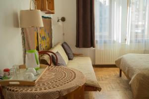 Posteľ alebo postele v izbe v ubytovaní Kolory Guest House