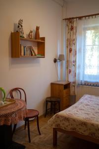 Posteľ alebo postele v izbe v ubytovaní Kolory Guest House