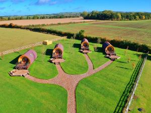 an aerial view of a tree in the middle of a field at Finest Retreats - Mingle Dale in York