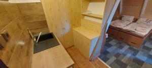 an overhead view of a wooden cabin with a sink at Penzion Svojanov in Svojanov
