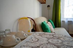 Posteľ alebo postele v izbe v ubytovaní Kolory Guest House